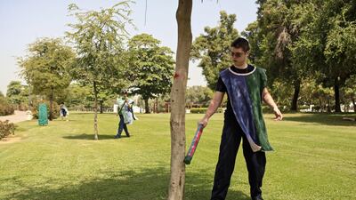 Zebbediah Jones, 16, practices his sword technique in Safa Park in Dubai.