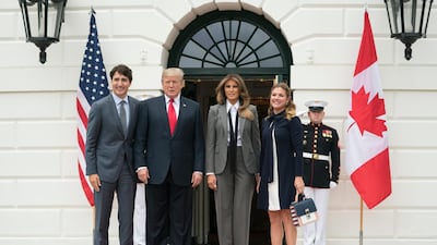 President Donald Trump and Melania Trump, in Ralph Lauren, with Prime Minister of Canada Justin Trudeau and his wife Sophie Gregoire Trudeau, at the White House in Washington DC, US, on October 11, 2017. EPA