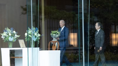Mr Biden arrives at the Japanese embassy in Washington. EPA