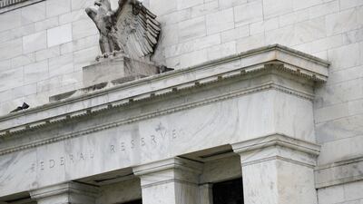 The US Federal Reserve ordered the country's 34 largest banks to suspend stock buybacks and dividend payouts until September 30. Photo: AP