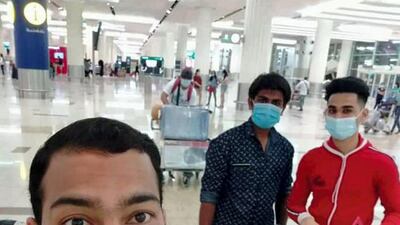 Workers and families return to India on private flights organised last year by a Dubai businessman with volunteers from the UAE. They are part of a newly launched group called Rescuing every distressed Indian overseas (Redio) that will help Indians in need across the globe return home. Courtesy: Dhanashree Patil