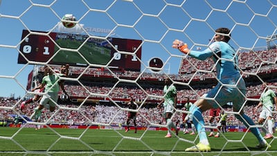 Qatar's Boualem Khoukhi puts the ball past Switzerland's Gregor Kobel for their first World Cup goal. Reuters