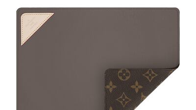 Office accessory: a mousepad crafted from leather and water-resistant monogram canvas. Courtesy Louis Vuitton