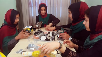 US officials will allow a group of Afghan girls into the country to participate in an international robotics competition after President Donald Trump intervened. AP / Ahmad Seir