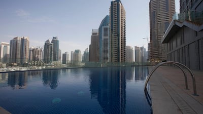 Buildings with extensive amenities, such as large landscaped areas, multiple swimming pools or concierge services, naturally cost more to operate than a simpler residential tower. Razan Alzayani / The National