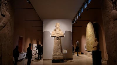 People visit the Assyrian Hall at the Iraq National Museum in Baghdad. AP