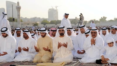 Sheikh Mohammed bin Rashid, the Vice President and Ruler of Dubai, kneels in the centre. To the left sits Sheikh Hamdan bin Mohammed, the Crown Prince of Dubai. On the far left of the image is by Sheikh Maktoum bin Mohammed, Deputy Ruler of Dubai and the chairman of Dubai Media Incorporated, and to his right is Sheikh Ahmed bin Saeed, chief executive and chairman of the Emirates Group. Kneeling next to Sheikh Mohammed is Minister of Finance, Sheikh Hamdan bin Rashid. AFP