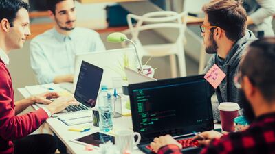 Five young people running their coding startup company. Entrepreneurship and the associated fluidity of running a start-up can be challenging when compared with an established business and a secure income. Getty Images