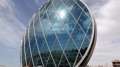 The first tenants of the 23-storey circular office building known as The Coin are expected to move in next month.