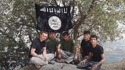This grab taken from ISIS video shows five men in Tajikistan declaring allegiance to ISIS leader Abu Bakr al-Baghdadi in July 2018. AP
