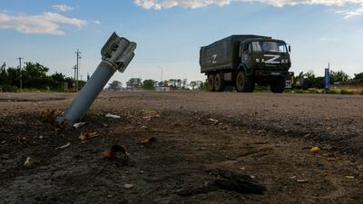 This projectile in the Russia-controlled village of Chornobaivka has yet to explode. Reuters