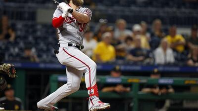 Bryce Harper of the Washington Nationals hits a two-run home run in the ninth inning against the Pittsburgh Pirates. Justin K Aller / Getty Images