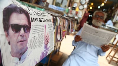 epaselect epa06911081 A Pakistani newspaper bears news of the general elections in Karachi, Pakistan, 26 July 2018. Millions of Pakistanis turned out for parliamentary elections on 25 July, despite the threat of violence by extremist militant groups. Voters had to choose from 11,000 candidates to elect 272 members of the Parliament for the next term. EPA/SHAHZAIB AKBER