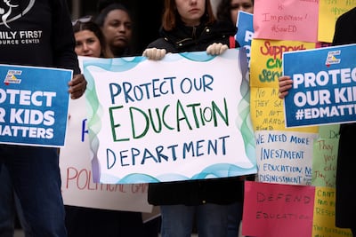 Protesters held a demonstration at the headquarters of the Department of Education. AP