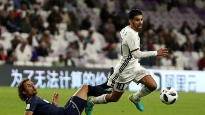 Albert Riera of Auckland City, left, fouls Mbark Boussoufa of Al Jazira during their Fifa Club World Cup play-off match. Getty Images