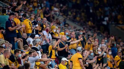 Fans of Dynamo Dresden at Rudolf-Harbig-Stadion. Getty