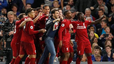 Daniel Sturridge, second right, scored a spectacular equaliser to rescue a point for Liverpool against Chelsea. Reuters