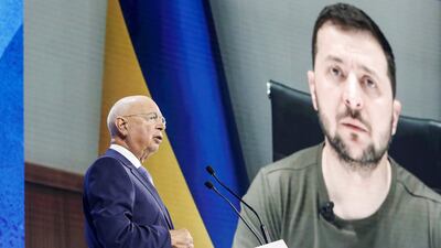 Founder and Executive chairman Klaus Schwab addresses the delegates with the Ukraine's President Volodymyr Zelenskiy displayed on a screen in the background during the opening ceremony of the World Economic Forum (WEF) in Davos, Switzerland on May 23. Reuters