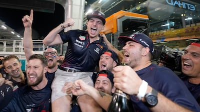The Red Bull team celebrate Max Verstappen's controversial victory at the 2021 Etihad Airways Abu Dhabi Grand Prix. AP Photo