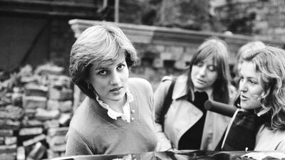 A 19-year-old Lady Diana Spencer speaks to the press while getting into a car in London, in 1980.