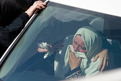 A relative of one of the four Palestinians killed in the clashes weeps outside a hospital. AFP