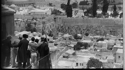 A view of the Moroccan Quarter, with the Dome of the Rock and Western Wall behind, in the Old City of Jerusalem in 1920. Library of Congress / Matson (G Eric and Edith) Photograph Collection