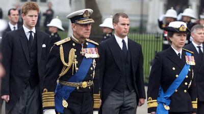 Prince Harry, Prince Phillip, Peter Phillips and Princess Anne walk behind the Royal coffin at the State Funeral of the Queen Mother in 2002 outside London's Westminster Abbey. Michael Crabtree/Getty Images