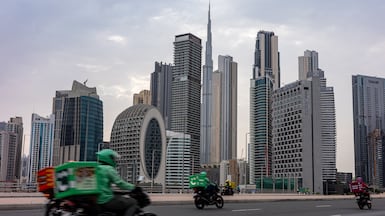 Food delivery riders in Downtown Dubai. Getty Images