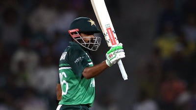 Pakistan's Babar Azam celebrates his a half century on his way to a score of 114 off 83 balls during the second One Day International between Pakistan and Australia at the Gaddafi Cricket Stadium in Lahore, Pakistan, on March 31, 2022. EPA