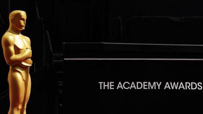 The Oscar statue is seen at the entrance before the 84th Annual Academy Awards. AFP