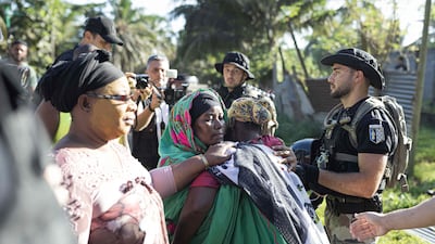 People react during the demolition of an informal settlement in Langoni, Mamoudzou, on the island of Mayotte in April. AFP