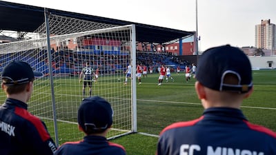 Supporters of FC Minsk attend the Belarus Championship match between FC Minsk and FC Dinamo-Minsk. AFP