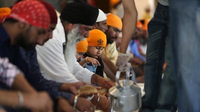 Anyone who walks into the temple is likely to be offered a drink and snack, or even a takeaway meal.