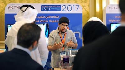 A student presents a self-operated water supply system that he worked on at the Technical and Vocational Education and Training Innovation Week event on Tuesday. Delores Johnson / The National