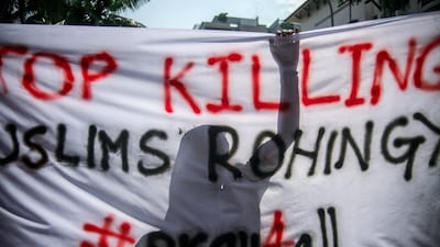 Muslim Rohingya demonstrate in Kuala Lumpur, Malaysia, demanding a stop to the killings and oppression of their people in Myanmar in July. Mohd Samsul Mohd Said / Getty Images