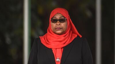 New Tanzanian President Samia Suluhu Hassan inspects a military parade following her swearing in as the country's first female President. AFP