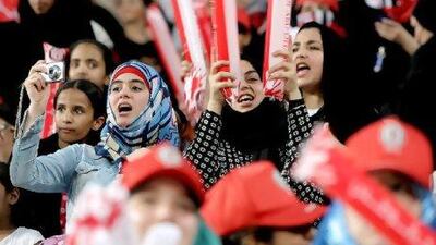 Women do attend football matches in this country, but, our columnist says, most seem more comfortable watching at home. Rich-Joseph Facun / The National