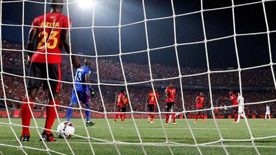 Uganda players react after conceding their first goal scored by Egypt's Mohamed Salah. Reuters