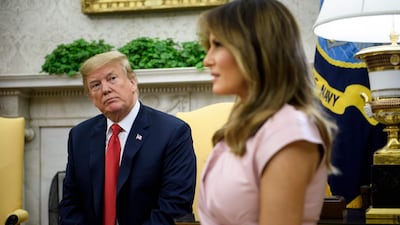 US President Donald Trump waits with first lady Melania Trump before meeting King Abdullah and Queen Rania. AFP