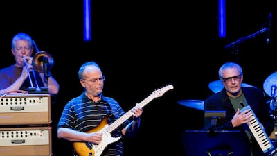 Walter Becker, centre, was part of US rock band Steely Dan and performed alongside fellow musicians Jim Pugh, left, and Donald Fagen. EPA