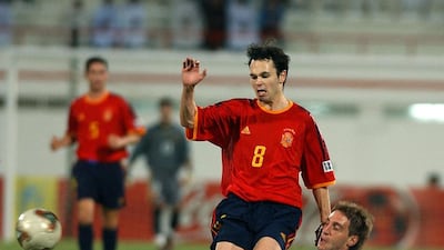 Spaniard Andres Iniesta, then 19, is tackled by Argentina's Pablo Zabaleta during the 2003 Fifa World Youth Championships in a group match in Sharjah. Mohammed Mahjoub / AFP / November 28, 2003