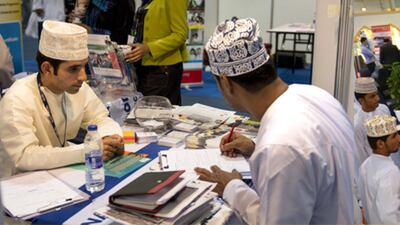 Job-seekers at the Omanisation Career Fair in Muscat, Oman. Saleh Al Shaibany for The National