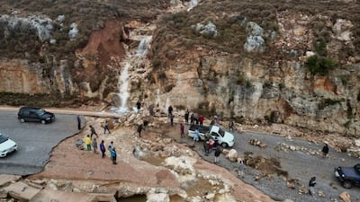 People stranded after Storm Daniel caused heavy rainfall in Shahat. Reuters