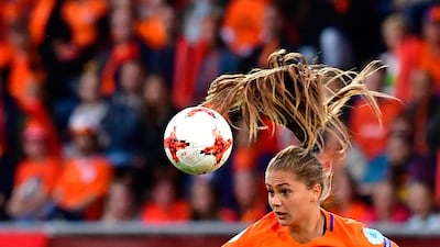 Netherlands' forward Lieke Martens heads the ball during the Uefa Women's Euro 2017 football match between Belgium and the Netherlands at Stadium Koning Wilhelm II in Tilburg on July 24, 2017. TOBIAS SCHWARZ / AFP