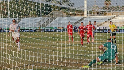 Ali Mabkhout scores UAE's winner from the penalty spot. AFP