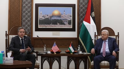 Palestinian President Mahmoud Abbas, right, and Mr Blinken meet in the West Bank city of Ramallah. EPA