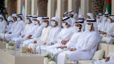 Guests attend the group wedding reception.