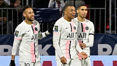 (From L) Paris Saint-Germain's Brazilian forward Neymar, Paris Saint-Germain's French forward Kylian Mbappe and Paris Saint-Germain's Moroccan defender Achraf Hakimi react during the French L1 football match between Clermont Foot 63 and Paris Saint-Germain (PSG) at the Gabriel-Montpied stadium in Clermont-Ferrand, central France, on April 9, 2022. (Photo by THIERRY ZOCCOLAN / AFP)