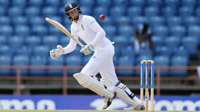 Joe Root wants his England teammates to keep the pressure building on West Indies. Jason O'Brien / Reuters