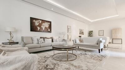 The 6-bedroom family home has porcelain tile flooring with a large open living area. Courtesy Luxhabitat